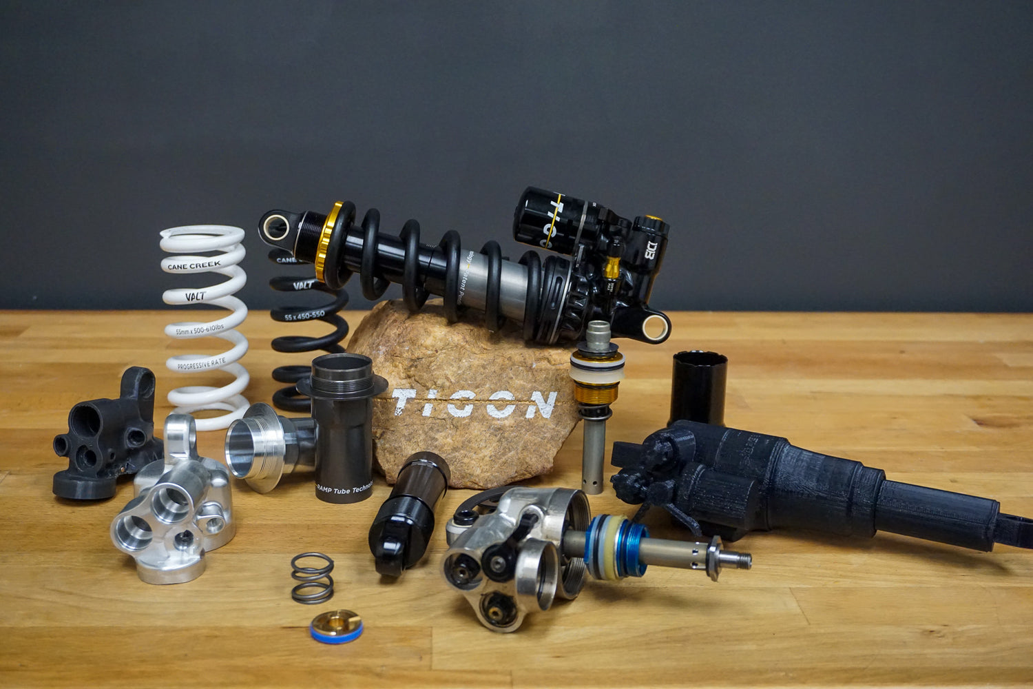 Pisgah Born: Development Story and Technical Deep Dive on Cane Creek’s new Tigon Air-Charged Coil Shock
