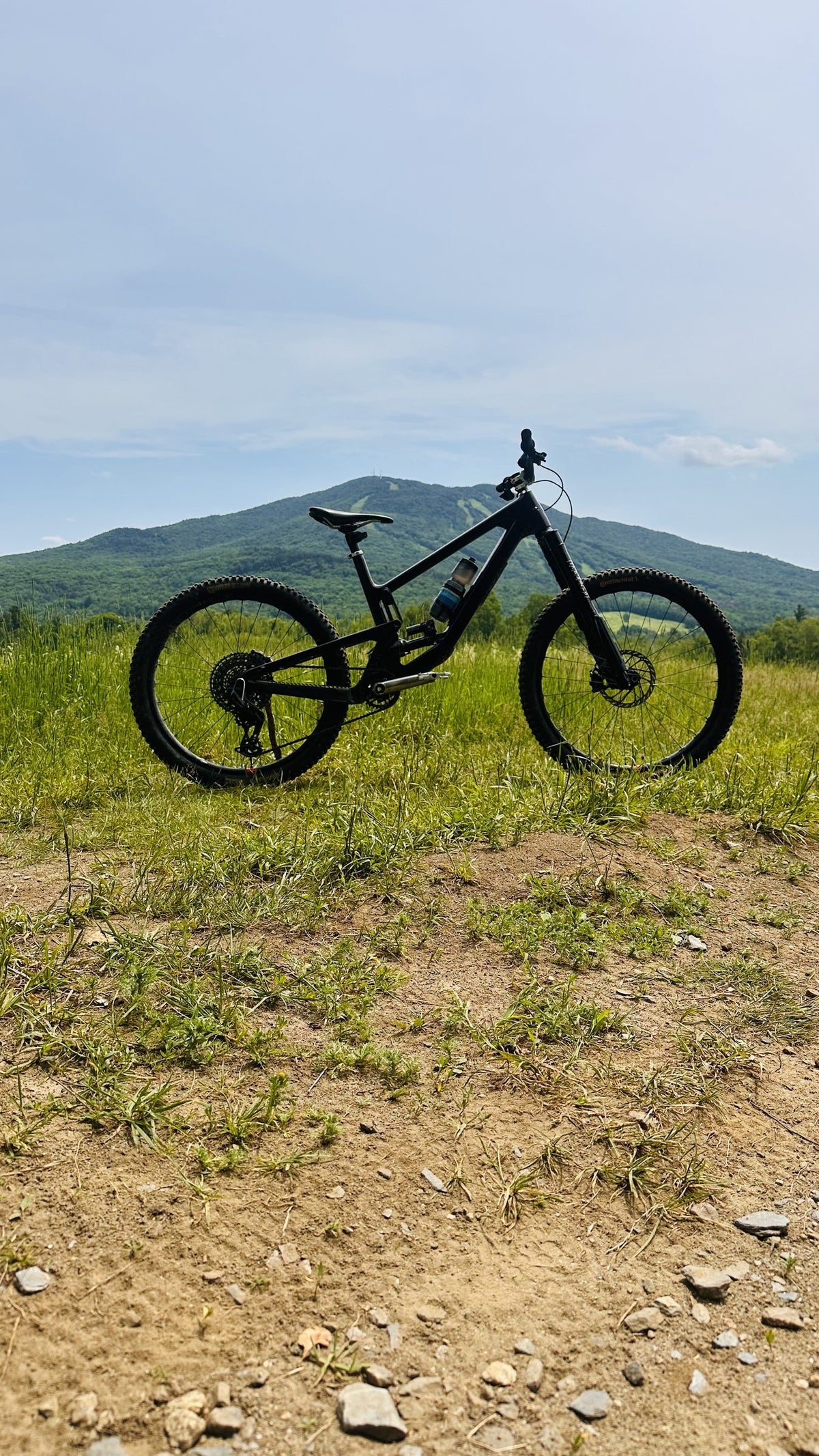 Santa Cruz Nomad with the Invert Enduro fork in a mountain meadow