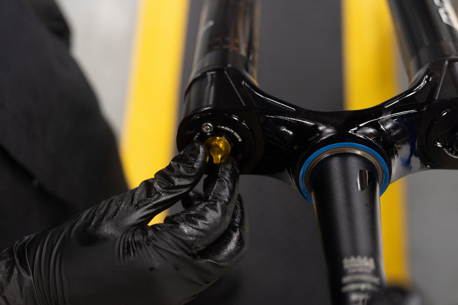 Thread on damper adjuster nut