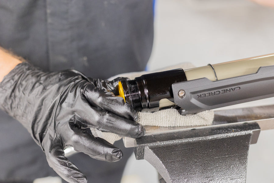 Threading air cartridge into dropout